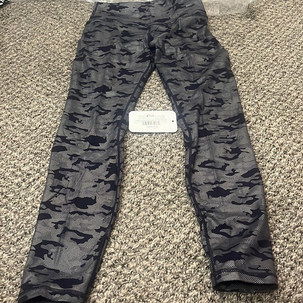 ZYIA leggings size 6-8.  Compressive.  Worn a handful of times.